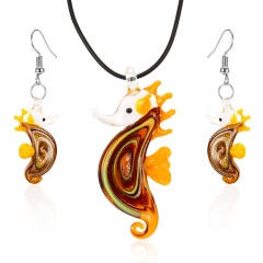 Decorated seahorse pendant glass necklace earring set orange