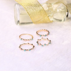 4 sets of colored wavy diamond studded knuckle rings Colour