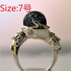 Holding a black bead vintage ring #7