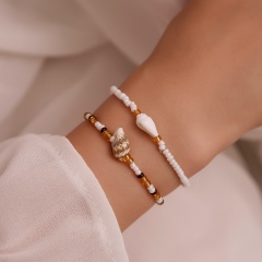 2 pieces of rice pearl conch shell bracelet set(Size: 19/20cm/Material: Alloy + Shell + Rice Beads + Elastic Cord) A