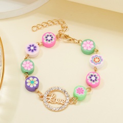 Colored butterfly elephant rhinestone soft pottery bracelet (circumference: 15+5cm/material: alloy + rhinestone + soft pottery) Flowers love