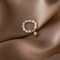 Round bead pearl elastic ring (material: copper + freshwater pearl / size: diameter about 15mm, bead 0.5cm) Round